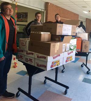 20 boxes of books collected for the AAUW Book Drive 